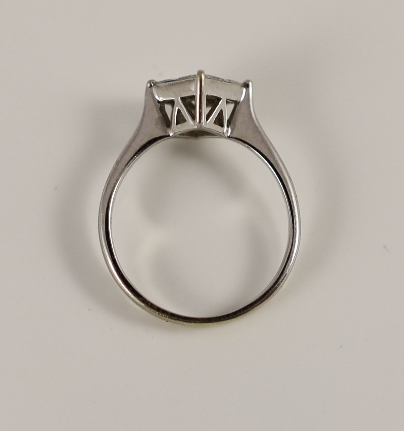 A modern 18k white gold and princess cut diamond set four stone cluster ring